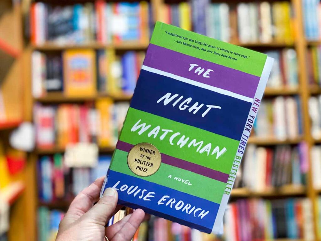 The Night Watchman book club questions book and shelves