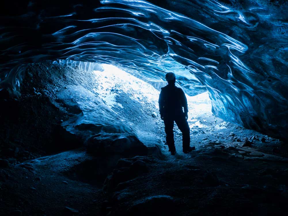 Iceland ice cave with person