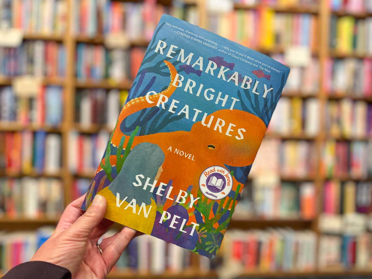 Remarkably Bright Creatures book club questions, with book cover and bookshelves in background.